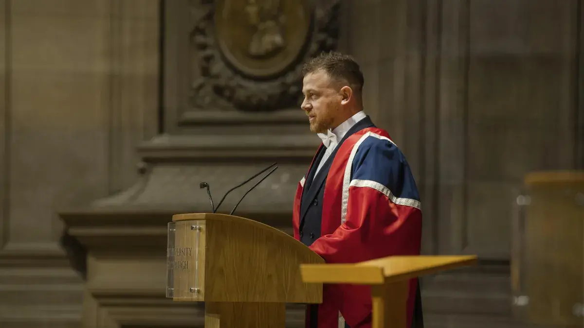 George Richards stands and gives a speech