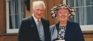 Joyce Darlington receiving her OBE
