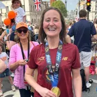 Lucy completing the marathon